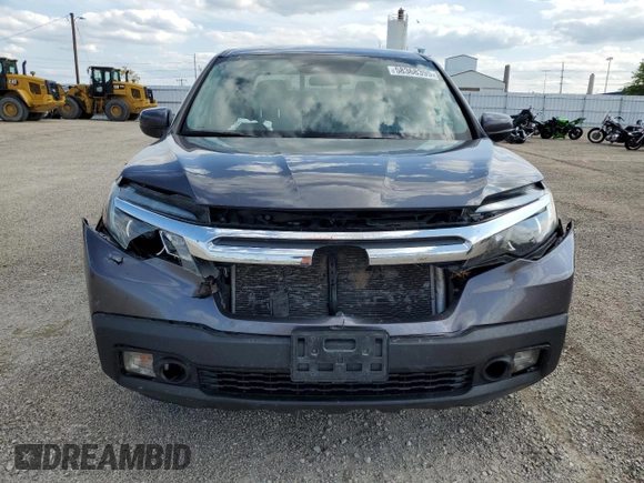 2020 Honda Ridgeline RTL with VIN 5FPYK3F5XLB017323, listed as a Copart auction lot 58368395 with 117,058 mi miles and Salvage title. Bid and sale history available at DreamBid. Image 5.