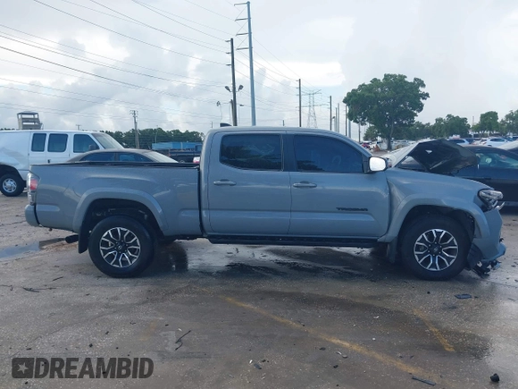 2020 Toyota Tacoma SR5 with VIN 3TMDZ5BN3LM080702, listed as a IAAI auction lot 42463811 with 70,185 mi miles and . Bid and sale history available at DreamBid. Image 13.