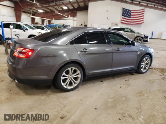 2013 Ford Taurus SEL z VIN 1FAHP2H83DG223446, wystawiony jako Copart lot #53783815 z przebiegiem 122 867 mil mil oraz Czysty tytuł • Clean title. Historia ofert i sprzedaży dostępna na DreamBid. Obrazek 3.
