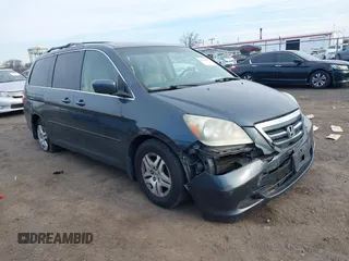 2005 Honda Odyssey EX-L with VIN 5FNRL38695B009507, listed as a IAAI auction lot 41910023 with 219,564 mi miles and . Bid and sale history available at DreamBid. Image 1.