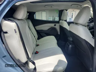 2023 Ford Mustang Mach-E Premium z VIN 3FMTK3R43PMA87670, wystawiony jako Copart lot #60697045 z przebiegiem 12 105 mil mil oraz Szkoda całkowita • Salvage title. Historia ofert i sprzedaży dostępna na DreamBid. Obrazek 11.