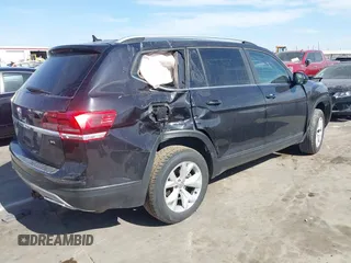2018 Volkswagen Atlas SE with VIN 1V2DR2CA1JC546005, listed as a IAAI auction lot 41724133 with 116,633 mi miles and . Bid and sale history available at DreamBid. Image 4.