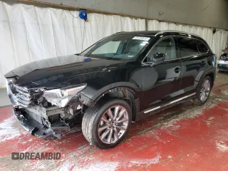2023 Mazda CX-9 Grand Touring z VIN JM3TCBDY7P0649022, wystawiony jako Copart lot #56946495 z przebiegiem 52 587 mil mil oraz Czysty tytuł • Clean title. Historia ofert i sprzedaży dostępna na DreamBid. Obrazek 1.