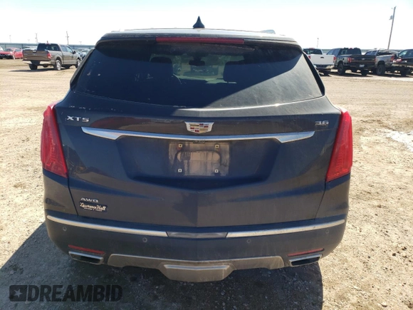 2017 Cadillac XT5 Platinum AWD z VIN 1GYKNFRS6HZ138810, wystawiony jako Copart lot #48029455 z przebiegiem 97 948 mil mil oraz Szkoda całkowita • Salvage title. Historia ofert i sprzedaży dostępna na DreamBid. Obrazek 6.
