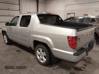 2009 Honda Ridgeline RTL with VIN 2HJYK16519H000129, listed as a IAAI auction lot 41891810 with 186,124 mi miles. Bid and sale history available at carsss.com. Image 3.