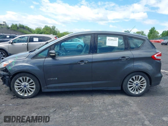 2018 Ford C-Max SE z VIN 1FADP5AU4JL101950, wystawiony jako IAAI lot #42289435 z przebiegiem 218 413 mil mil oraz . Historia ofert i sprzedaży dostępna na DreamBid. Obrazek 14.