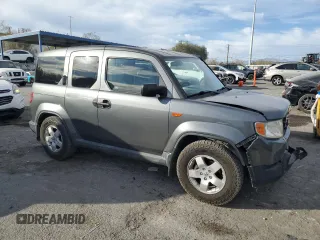 2010 Honda Element EX with VIN 5J6YH1H75AL006079, listed as a Copart auction lot 87446514 with 146,422 mi miles and Salvage Title. Bid and sale history available at DreamBid. Image 4.