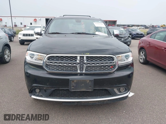 2014 Dodge Durango Citadel with VIN 1C4SDJET5EC314304, listed as a IAAI auction lot 42682540 with 213,651 mi miles and . Bid and sale history available at DreamBid. Image 12.