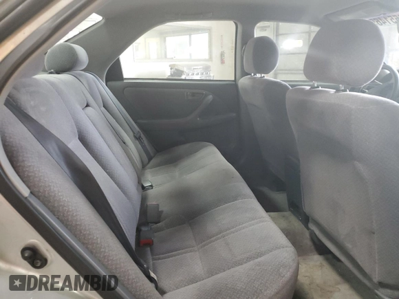 2001 Toyota Camry LE z VIN 4T1BF28K21U963819, wystawiony jako Copart lot #54551465 z przebiegiem 199 472 mil mil oraz Szkoda całkowita • Salvage title. Historia ofert i sprzedaży dostępna na DreamBid. Obrazek 10.
