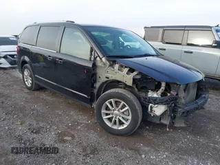 2019 Dodge Grand Caravan SXT with VIN 2C4RDGCG1KR740033, listed as a IAAI auction lot 41208476 with 182,575 mi miles. Bid and sale history available at carsss.com. Image 1.
