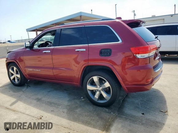 2015 Jeep Grand Cherokee Overland with VIN 1C4RJECG3FC686536, listed as a Copart auction lot 61058215 with 132,282 mi miles and Salvage title. Bid and sale history available at DreamBid. Image 2.