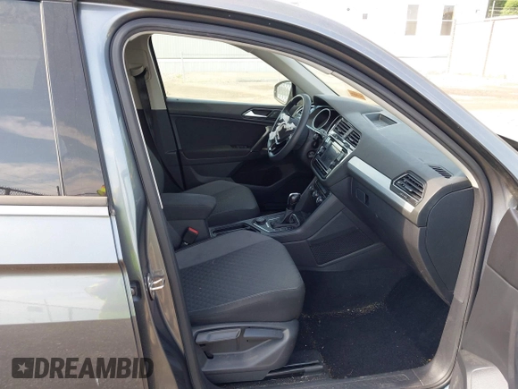 2018 Volkswagen Tiguan S with VIN 3VV0B7AX5JM108306, listed as a IAAI auction lot 42741783 with 71,040 mi miles and . Bid and sale history available at DreamBid. Image 5.