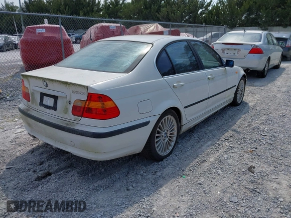 2003 BMW 3 Series 330i with VIN WBAEV53443KM30865, listed as a IAAI auction lot 42027481 with 1 mi miles. Bid and sale history available at carsss.com. Image 4.