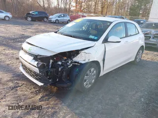 2022 Kia Rio S with VIN 3KPA25AD5NE443465, listed as a IAAI auction lot 41230852 with 20,460 mi miles and . Bid and sale history available at DreamBid. Image 2.