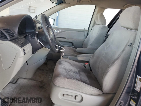2006 Honda Odyssey EX with VIN 5FNRL384X6B461661, listed as a Copart auction lot 61051915 with 190,578 mi miles and Salvage title. Bid and sale history available at DreamBid. Image 7.