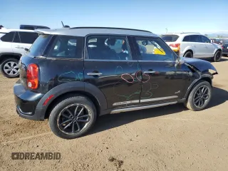 2016 MINI Countryman S with VIN WMWZC5C59GWU21416, listed as a Copart auction lot 57477455 with 119,868 mi miles and Salvage title. Bid and sale history available at DreamBid. Image 3.