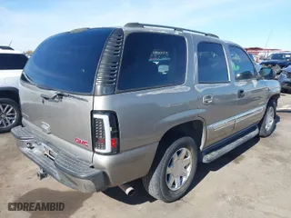 2003 GMC Yukon SLT with VIN 1GKEK13Z83J333386, listed as a IAAI auction lot 41425453 with 118,889 mi miles. Bid and sale history available at carsss.com. Image 4.