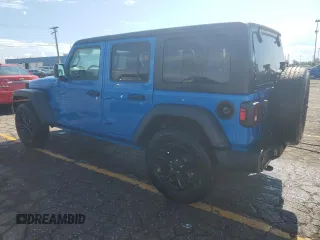2023 Jeep Wrangler Sport with VIN 1C4HJXDN6PW543133, listed as a Copart auction lot 69230224 with 5,370 mi miles and Clean Title. Bid and sale history available at DreamBid. Image 2.
