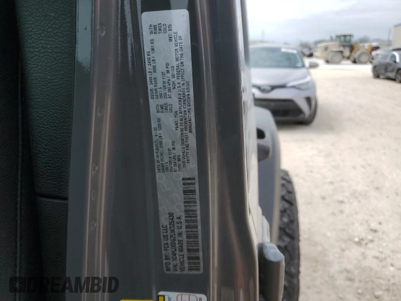 2020 Jeep Wrangler Unlimited Sport Altitude with VIN 1C4HJXDG2LW325430, listed as a Copart auction lot 46953185 with 69,919 mi miles and Salvage title. Bid and sale history available at DreamBid. Image 14.