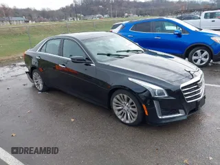 2016 Cadillac CTS with VIN 1G6AZ5SS0G0118245, listed as a IAAI auction lot 41028540 with 114,911 mi miles and . Bid and sale history available at DreamBid. Image 1.