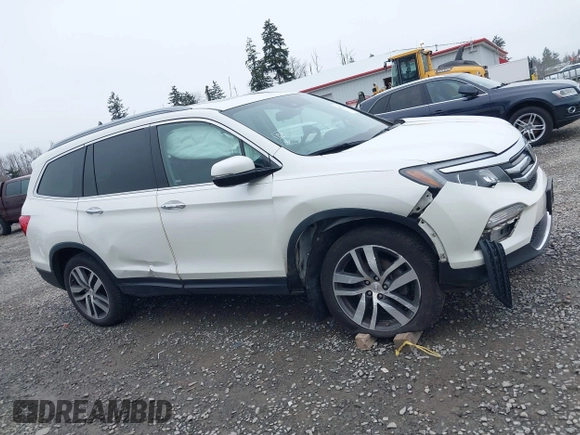 2017 Honda Pilot Elite with VIN 5FNYF6H06HB096156, listed as a IAAI auction lot 41771161 with 73,889 mi miles and . Bid and sale history available at DreamBid. Image 13.