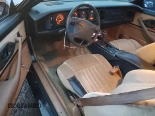 1990 Pontiac Firebird with VIN 1G2FS23TXLL205077, listed as a Copart auction lot 44035705 with 142,809 mi miles and Salvage title. Bid and sale history available at DreamBid. Image 8.