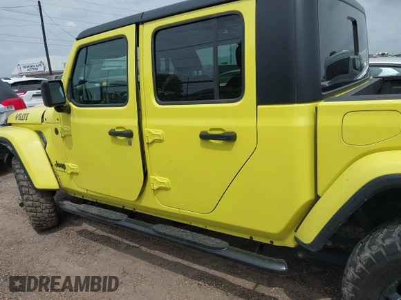 2023 Jeep Gladiator Sport S with VIN 1C6HJTAG1PL576760, listed as a IAAI auction lot 42106618 with 24,738 mi miles and . Bid and sale history available at DreamBid. Image 14.