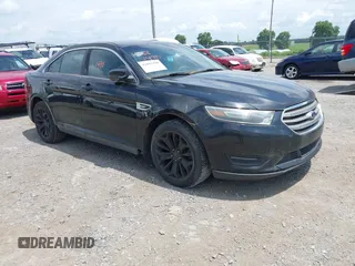 2015 Ford Taurus SEL with VIN 1FAHP2E88FG136181, listed as a IAAI auction lot 42681490 with 230,000 mi miles and . Bid and sale history available at DreamBid. Image 1.