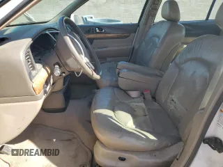 2001 Lincoln Continental z VIN 1LNHM97V31Y673523, wystawiony jako Copart lot #52451385 z przebiegiem 133 879 mil mil oraz Szkoda całkowita • Salvage title. Historia ofert i sprzedaży dostępna na DreamBid. Obrazek 7.