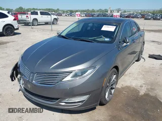 2014 Lincoln MKZ z VIN 3LN6L2G92ER835456, wystawiony jako IAAI lot #41985573 z przebiegiem 174 080 mil mil oraz . Historia ofert i sprzedaży dostępna na DreamBid. Obrazek 17.
