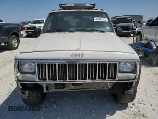 1996 Jeep Cherokee Sport with VIN 1J4FJ68S1TL128597, listed as a Copart auction lot 49600545 with 201,074 mi miles and Salvage title. Bid and sale history available at DreamBid. Image 5.
