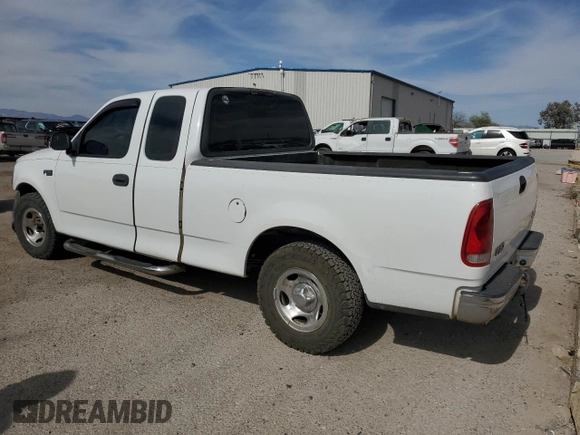 2003 Ford F-150 XL z VIN 1FTRX17233NB92067, wystawiony jako Copart lot #57986555 z przebiegiem 179 101 mil mil oraz Szkoda całkowita • Salvage title. Historia ofert i sprzedaży dostępna na DreamBid. Obrazek 2.