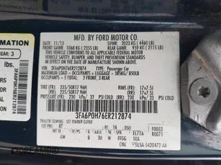 2014 Ford Fusion SE with VIN 3FA6P0H76ER212874, listed as a IAAI auction lot 41962700 with 216,300 mi miles. Bid and sale history available at carsss.com. Image 9.