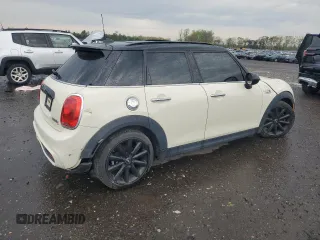 2018 MINI Hardtop 4 Door Cooper S with VIN WMWXU3C51J2F50454, listed as a Copart auction lot 53236535 with 65,151 mi miles and Salvage title. Bid and sale history available at DreamBid. Image 3.