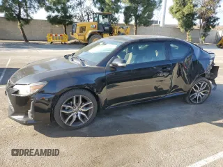 2016 Scion tC with VIN JTKJF5C79GJ020110, listed as a Copart auction lot 86995214 with 79,165 mi miles and Salvage Title. Bid and sale history available at carsss.com. Image 1.