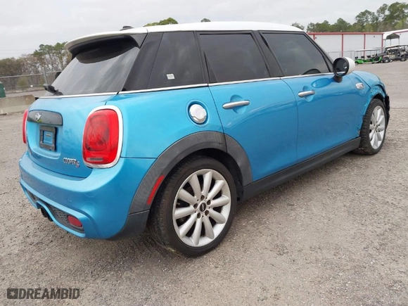 2017 MINI Hardtop 4 Door Cooper S with VIN WMWXU3C37H2F48944, listed as a IAAI auction lot 41732140 with 154563 miles. Bid and sale history available at carsss.com. Image 4.