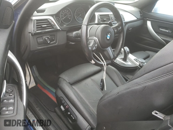 2015 BMW 4 Series 428i xDrive with VIN WBA4C9C5XFG135004, listed as a Copart auction lot 60551714 with 209,083 mi miles and Salvage Title. Bid and sale history available at DreamBid. Image 8.