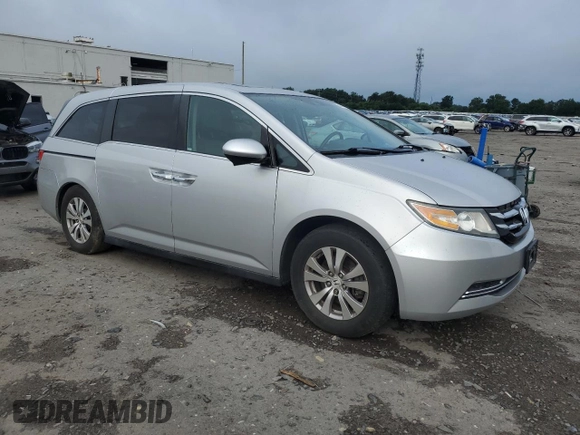 2014 Honda Odyssey EX-L with VIN 5FNRL5H62EB003236, listed as a Copart auction lot 63342255 with 147,398 mi miles and Salvage title. Bid and sale history available at DreamBid. Image 4.