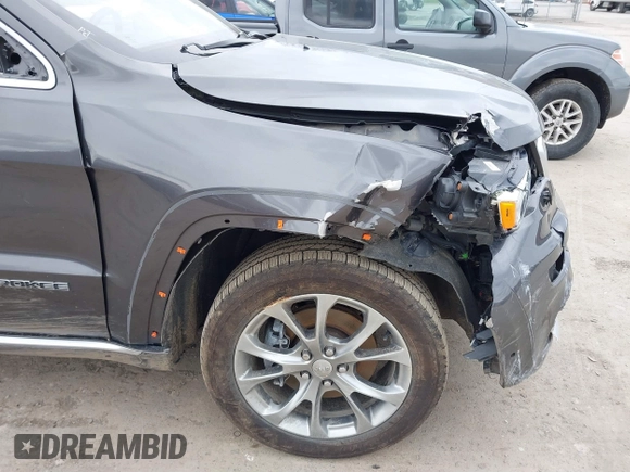 2020 Jeep Grand Cherokee Summit with VIN 1C4RJFJT2LC408499, listed as a IAAI auction lot 41854021 with 78,189 mi miles and . Bid and sale history available at DreamBid. Image 18.