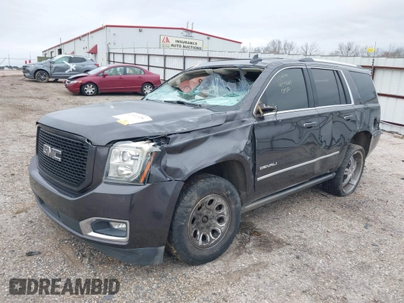 2016 GMC Yukon Denali with VIN 1GKS2CKJ8GR457661, listed as a IAAI auction lot 41522729 with 1 mi miles. Bid and sale history available at carsss.com. Image 2.