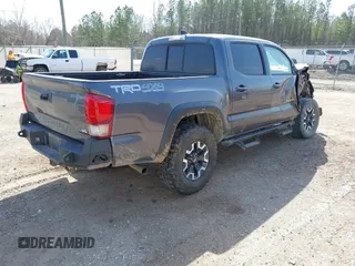 2016 Toyota Tacoma SR with VIN 5TFCZ5AN5GX010227, listed as a IAAI auction lot 41792719 with 228,070 mi miles. Bid and sale history available at carsss.com. Image 4.