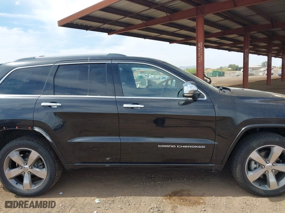 2014 Jeep Grand Cherokee Overland with VIN 1C4RJFCG4EC273786, listed as a IAAI auction lot 41901304 with 73,055 mi miles. Bid and sale history available at carsss.com. Image 13.