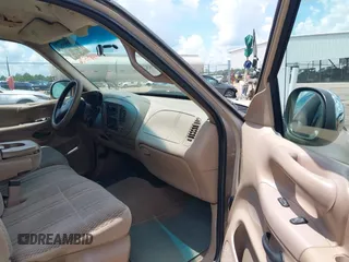 1998 Ford F-150 with VIN 1FTZX1760WNB21027, listed as a IAAI auction lot 42651506 with 189,442 mi miles and . Bid and sale history available at DreamBid. Image 5.