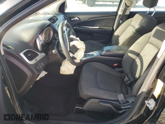 2015 Dodge Journey American Value with VIN 3C4PDCAB9FT692632, listed as a Copart auction lot 55261175 with 139,874 mi miles and Salvage Title. Bid and sale history available at DreamBid. Image 7.