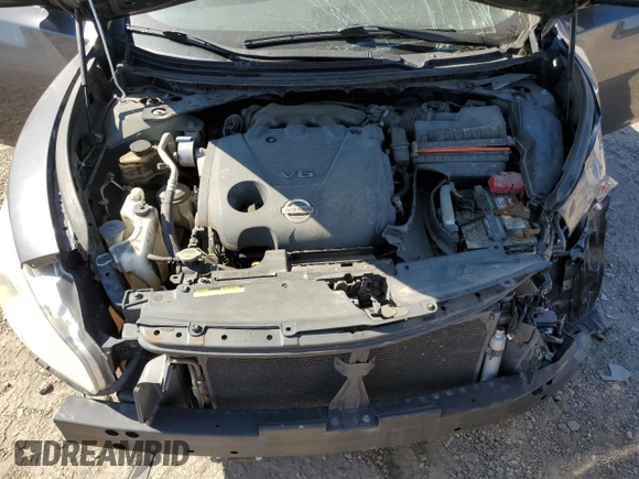 2010 Nissan Maxima SV z VIN 1N4AA5AP3AC827751, wystawiony jako Copart lot #51962265 z przebiegiem 150 576 mil mil oraz Szkoda całkowita • Salvage title. Historia ofert i sprzedaży dostępna na DreamBid. Obrazek 14.