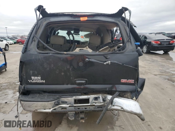 2005 GMC Yukon SLT z VIN 1GKEC13T45R134381, wystawiony jako Copart lot #45040165 z przebiegiem Nie podano mil oraz Szkoda całkowita • Salvage title. Historia ofert i sprzedaży dostępna na DreamBid. Obrazek 6.