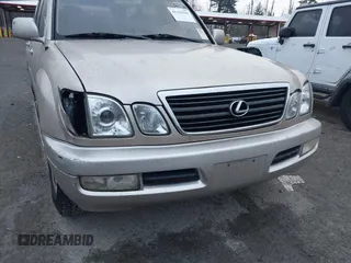 1999 Lexus LX 470 z VIN JT6HT00W4X0056023, wystawiony jako IAAI lot #41319329 z przebiegiem 206 974 mil mil oraz . Historia ofert i sprzedaży dostępna na DreamBid. Obrazek 6.