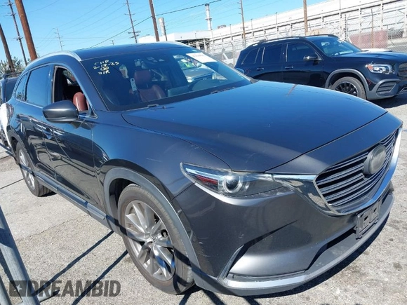 2017 Mazda CX-9 Signature z VIN JM3TCBEY2H0131030, wystawiony jako IAAI lot #41644367 z przebiegiem 193 231 mil mil oraz . Historia ofert i sprzedaży dostępna na DreamBid. Obrazek 1.
