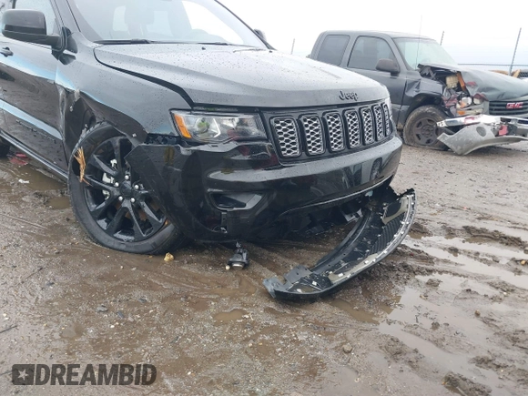 2022 Jeep Grand Cherokee Laredo X with VIN 1C4RJEAG0NC126796, listed as a IAAI auction lot 40755171 with 50,159 mi miles and . Bid and sale history available at DreamBid. Image 6.