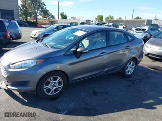 2014 Ford Fiesta SE with VIN 3FADP4BJ7EM215721, listed as a IAAI auction lot 40565422 with 115,980 mi miles. Bid and sale history available at carsss.com. Image 18.